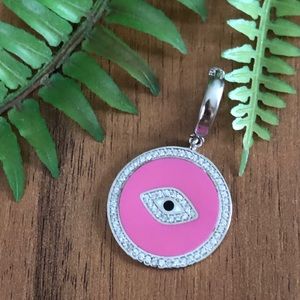 Pink colored eye designed necklace or earing!